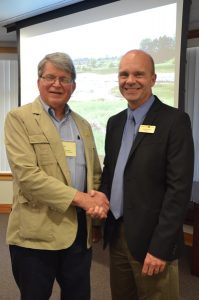 Comox Valley Project Watershed Board Chair Paul Horgen and NIC President John Bowman sign a Memorandum of Understanding agreeing to work together to restore the K’ómoks Estuary and research new guidelines for blue carbon research in B.C.